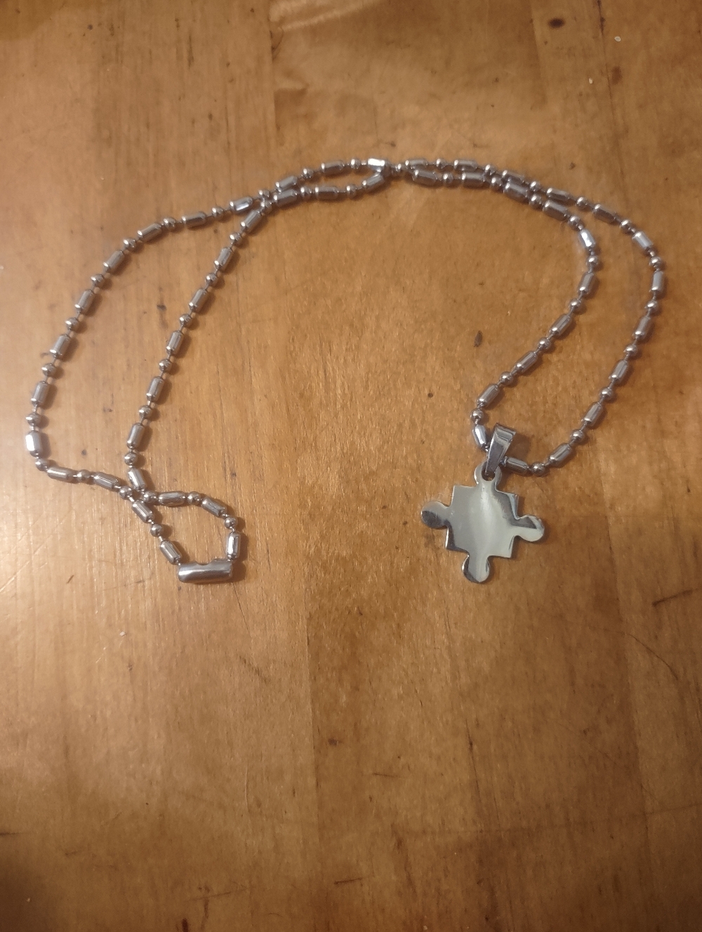 Silver Toned Puzzle Piece Pendant Necklace - Picture 4 of 7